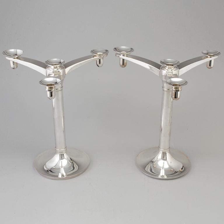 RICHARD FOX, a pair of three armed, four light sterling candelabra, London, 2001 and 2013.