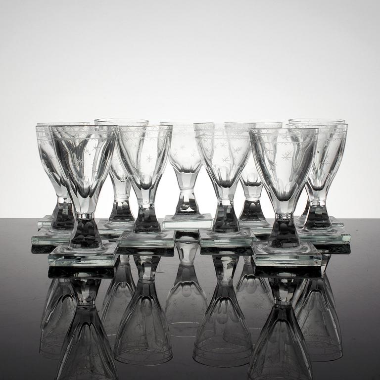 A set of 11 cut and etched liquer glasses, 19th Century.