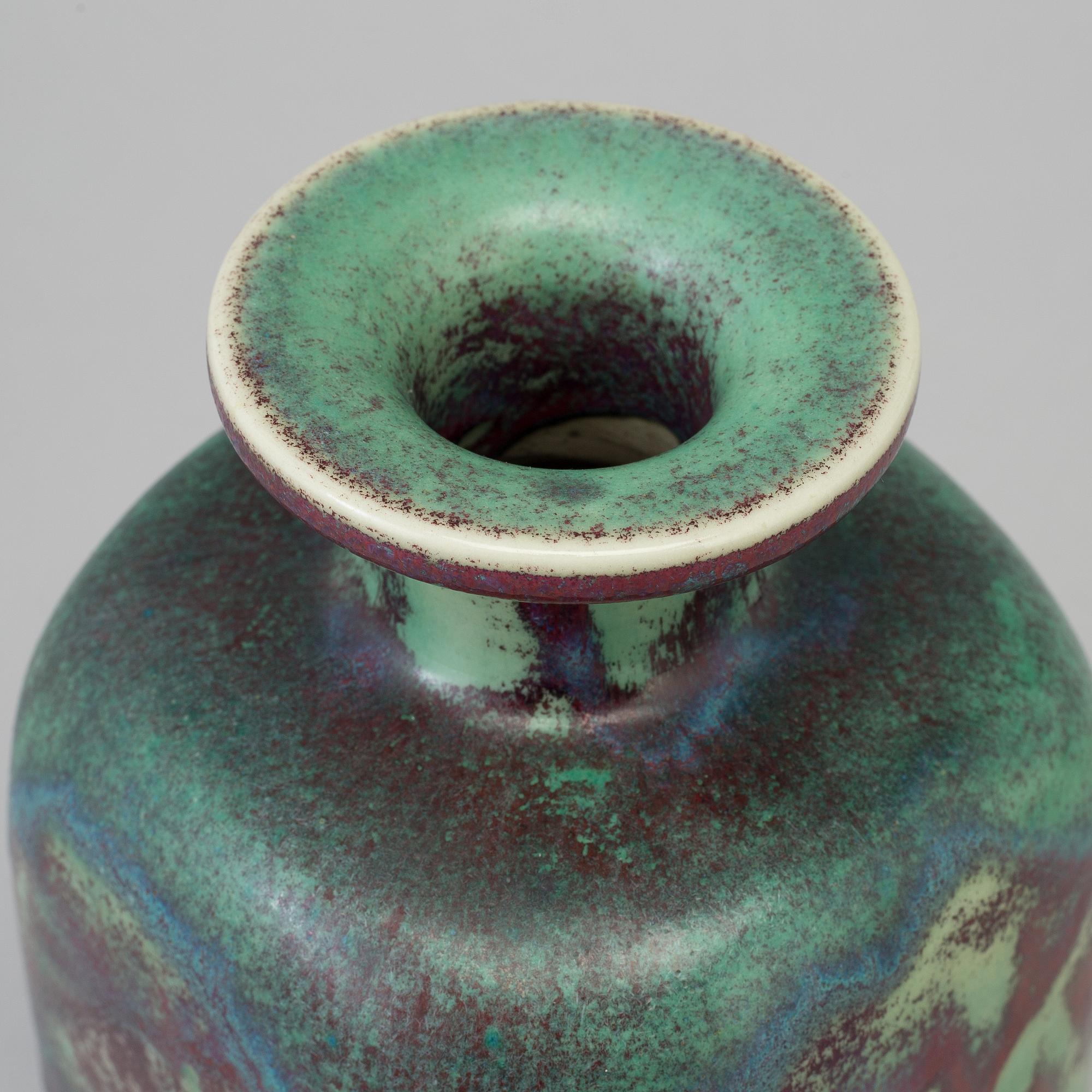A stoneware vase by Stig Lindberg dated 1971.