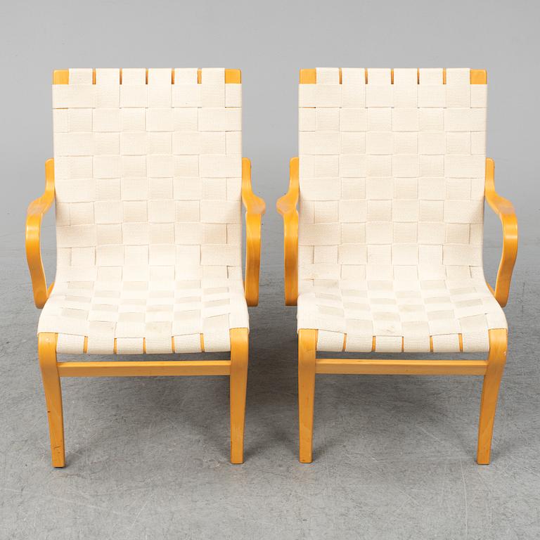 BRUNO MATHSSON, a pair of 'Mina' armchairs from Bruno Mathsson International, Värnamo, 1997.
