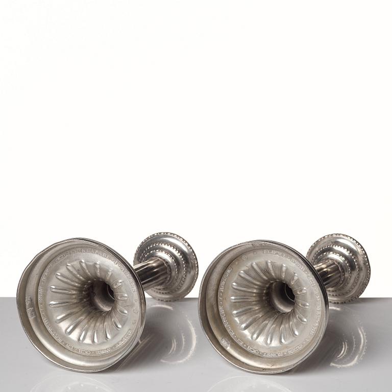 A pair of Gustavian pewter candlesticks by R Ryman 1784.