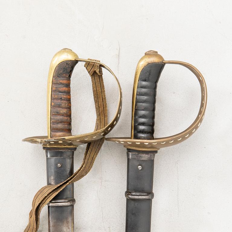 Two Swedish sabres, 1893 cavalry pattern, with scabbards.