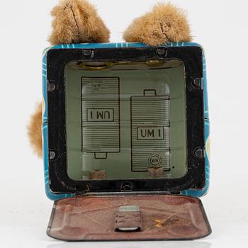 A set of five toys, including 'Rolly' clown from Schuco, 20th century.