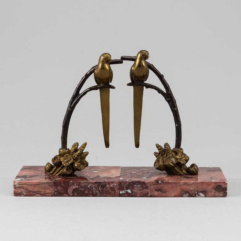 A pair of bronze and marble book-ends, first half of the 20th century.