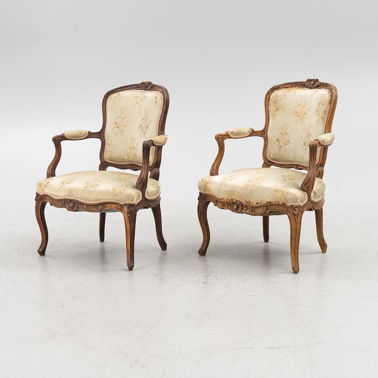 A Pair of Louis XV Beechwood Armchairs, 18th Century.