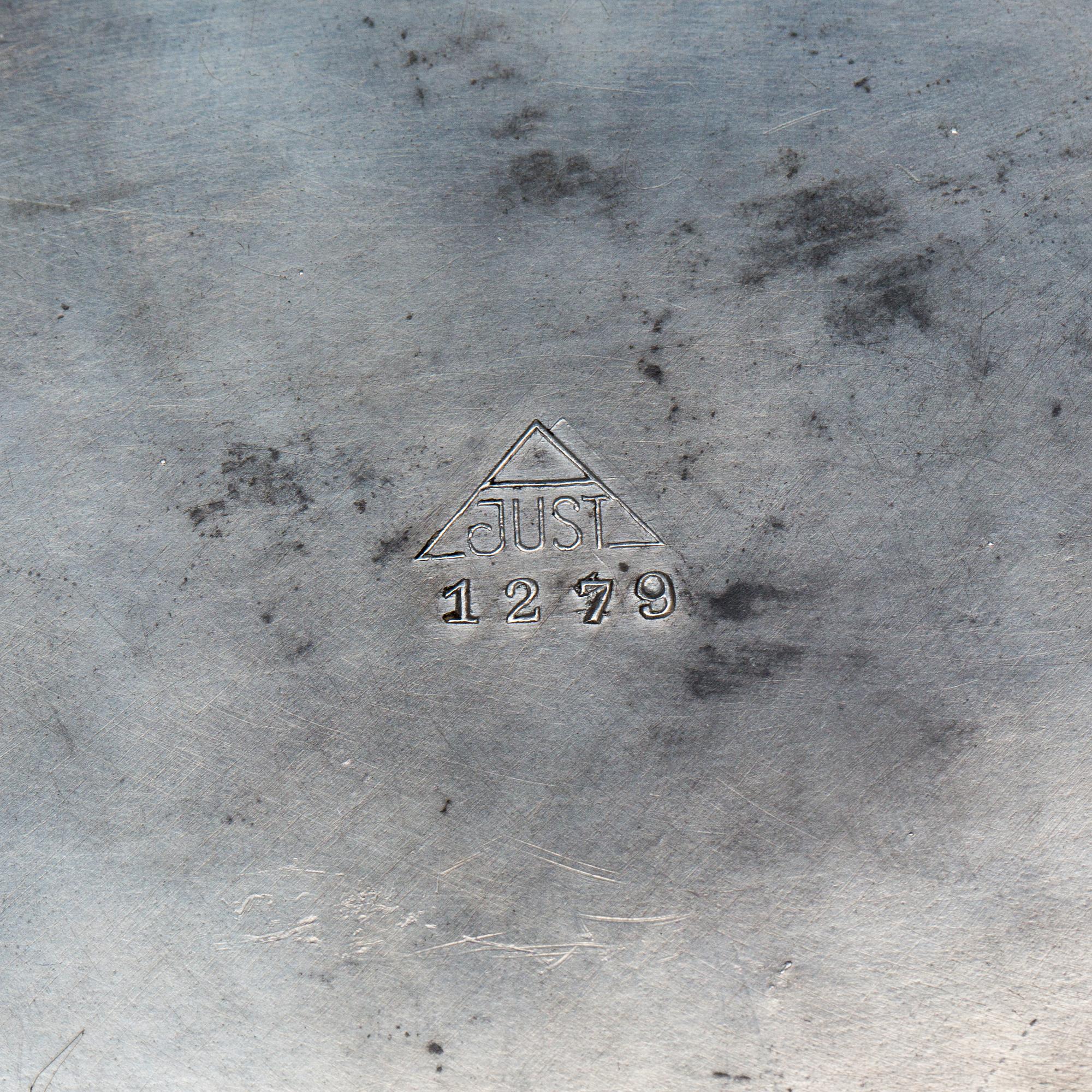 SKÅL, tenn, Just Andersen. 1900-talets första hälft.