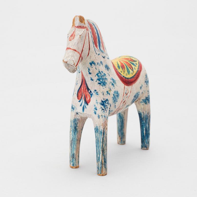 A painted folk art dala horse early 20th century.