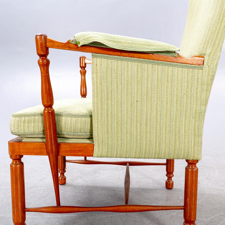 A Josef Frank mahogany armchair model nr 880 Firma Svenskt Tenn.