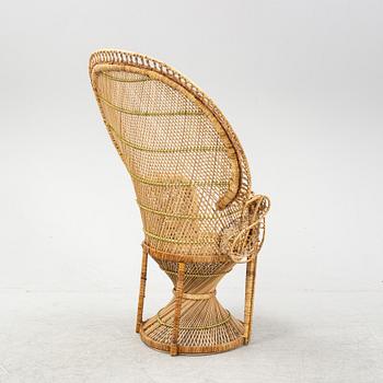 A wicker chair, 20th Century.