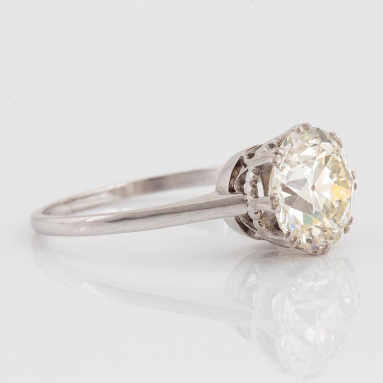 A platinum ring set with an old-cut diamond 3.50 cts according to engraving.