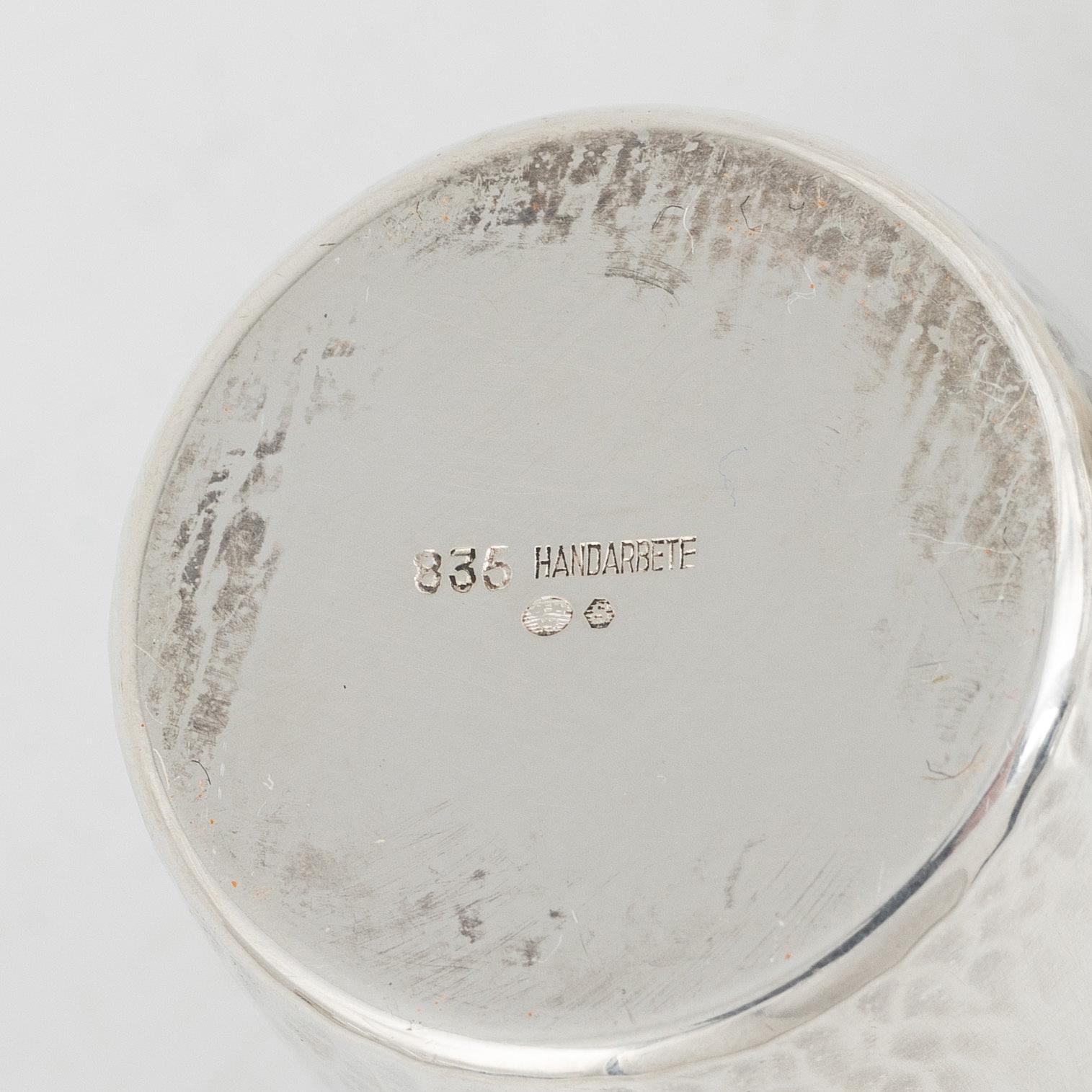 A set of 16 silver cups, including GAB, Stockholm 1964.