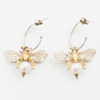 Maria Nilsdotter, a single earring, "rain earring" and a pair, silver with pearls and quartz.