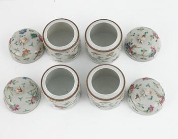 Four Chinese porcelain boxes with covers, late 19th Century.