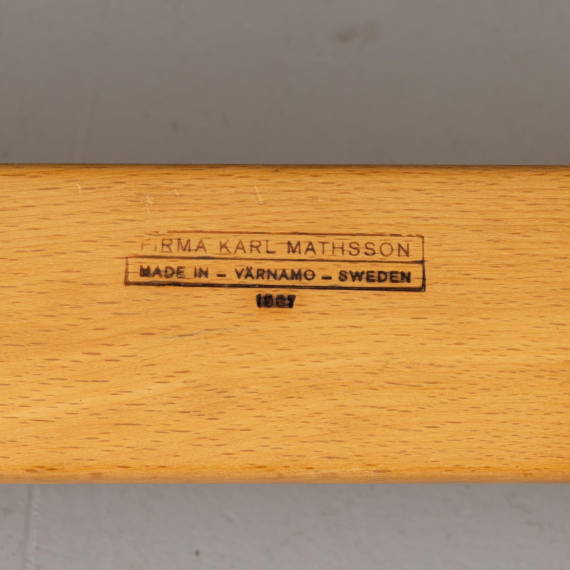 Bruno Mathsson, fåtöljer, ett par, med en fotpall, "Pernilla", DUX.