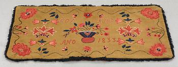 A carriage cushion, embroidered, ca 51-52 x 104,5-107 cm, signed and dated COS BMD ANO 1833, Scania.