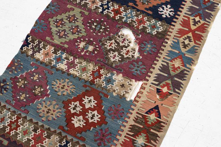 An antique kilim fragment, central Anatolia, c. 238 x 82 cm.