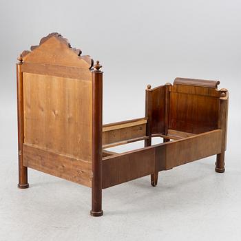 A late Empire bed, mid-19th century.