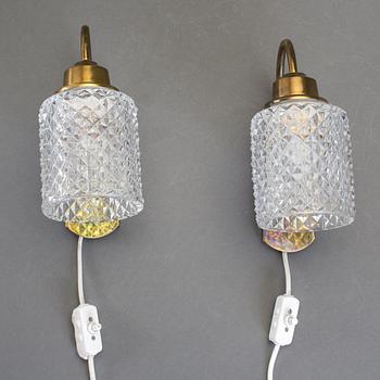 VÄGGLAMPETTER, ett par, 1900-talets andra hälft.