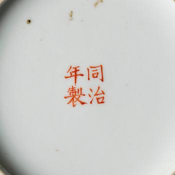 A pair of yellow ground 'butterfly' dishes, late Qing dynasty with Tongzhi mark in red.