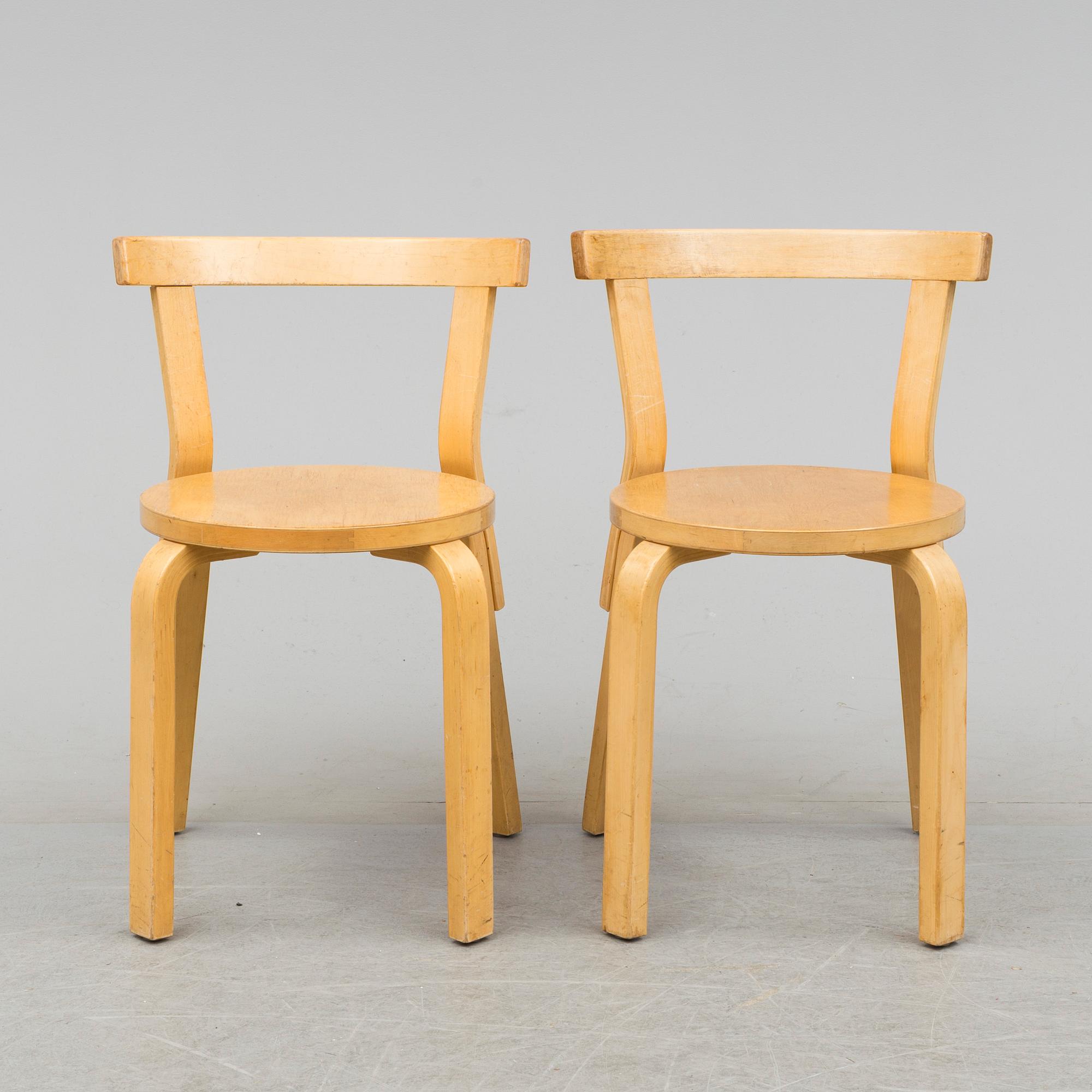 Nine model 68 chairs by Alvar Aalto, designed in 1935.