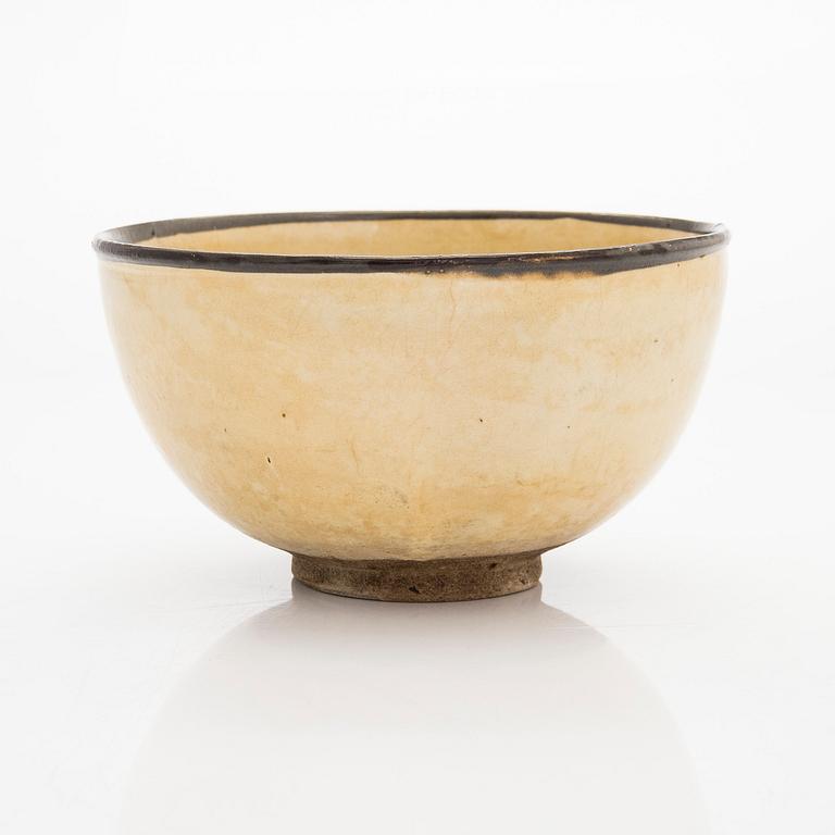 A creme glazed bowl, presumably Song/Yuan dynasty.