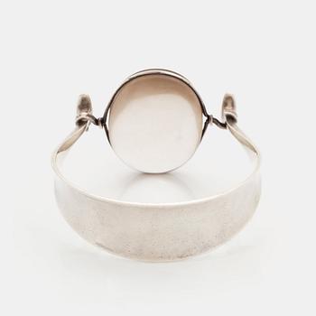 Vivianna Torun Bülow-Hübe, a sterling bangle with a qvartz, Georg Jensen, Copenhagen 1945-77, design nr 205.