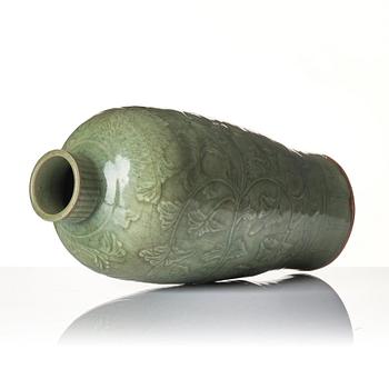 A carved celadon 'longquan' vase, Yuan/Ming dynasty.