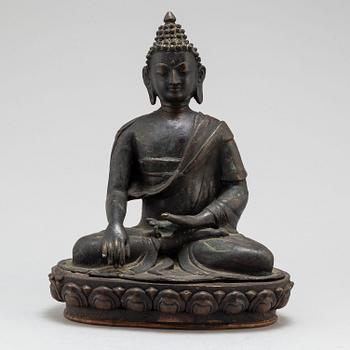 A Thai bronze buddha, 20th century.
