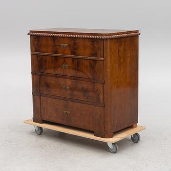 A late Empire chest of drawers, second half of the 19th Century.