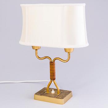 SONJA KATZIN, A 1940s brass table light from Asea, Sweden.