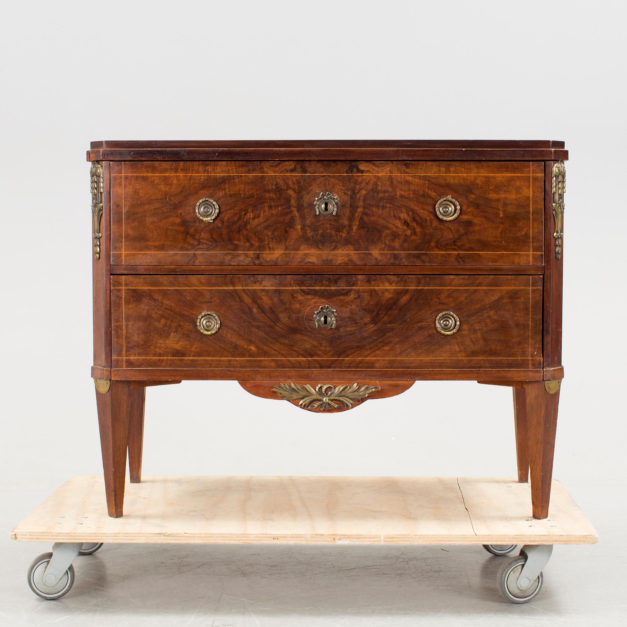A gustavian style chest of drawers, late 19th century.