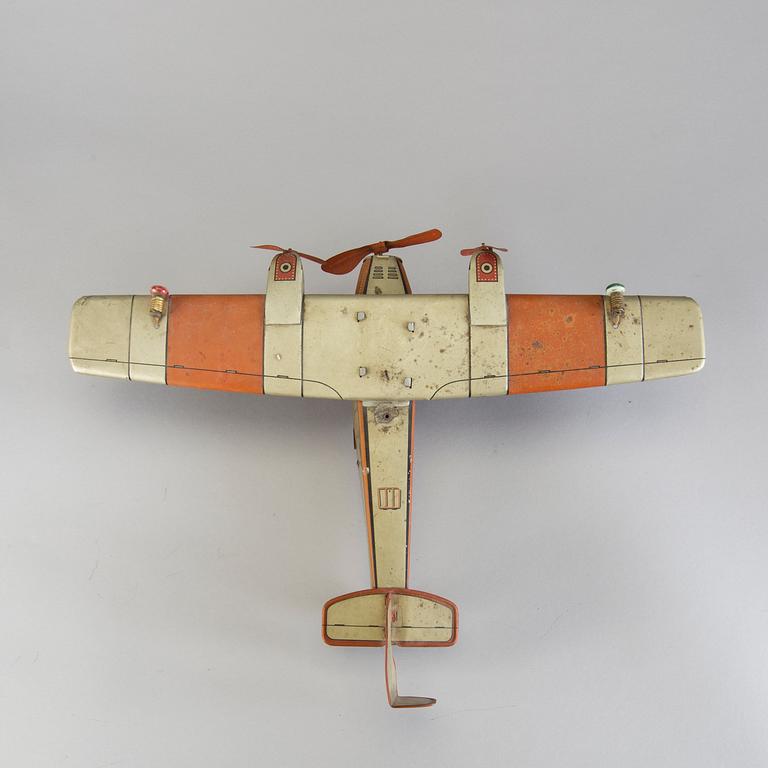 A Tipp & Co tinplate airplane, Germany, 1930s.