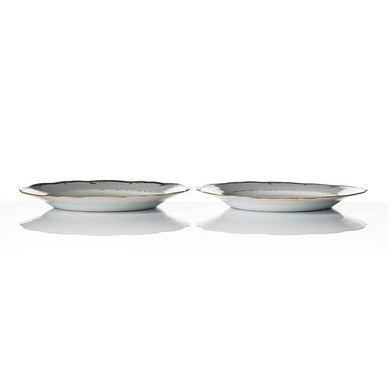 A pair of 'Chinese Export' armorial dinner plates, Qing dynasty, 1790's.