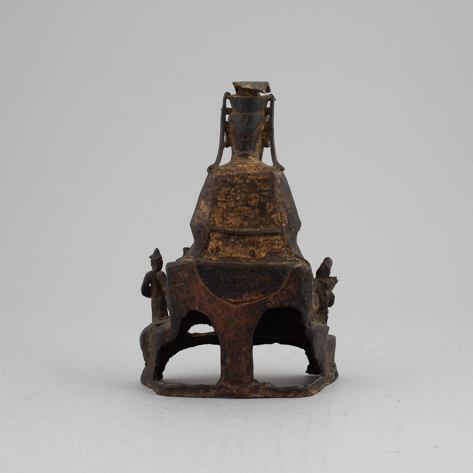 A bronze daoist dignitary with attendants, late Ming dynasty.