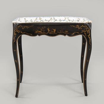 A Swedish Rococo faience tea table, Marieberg 1770.