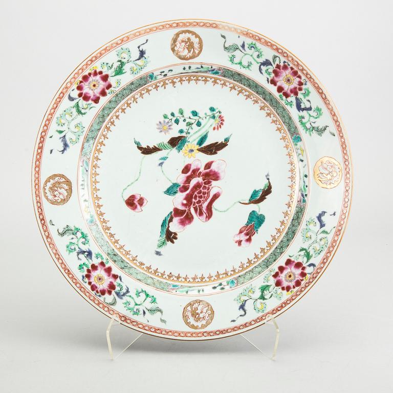 A Chinese Qianlong porcelain plate and dish in famille rose colours.