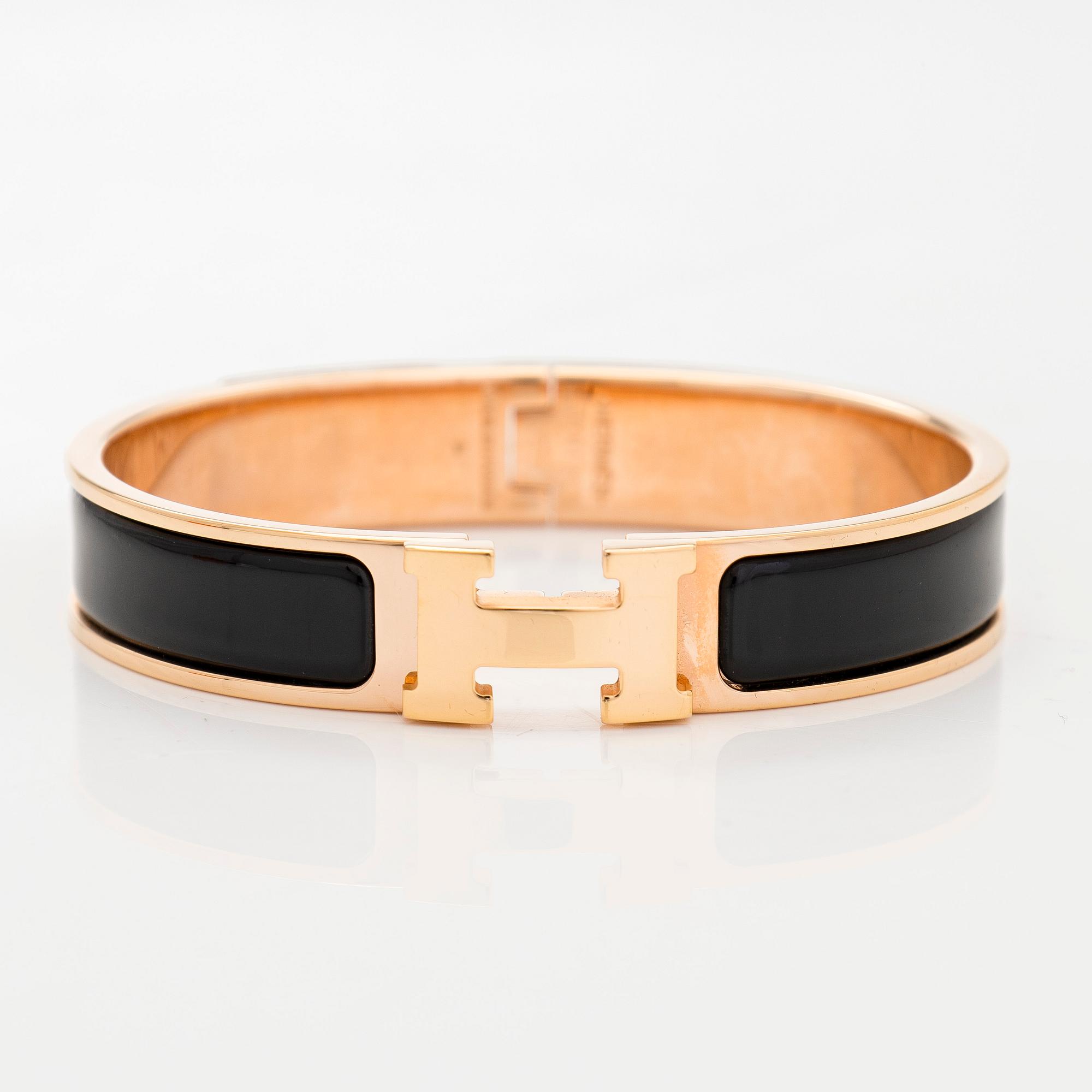 Hermès, a 'Clic H' bracelet.