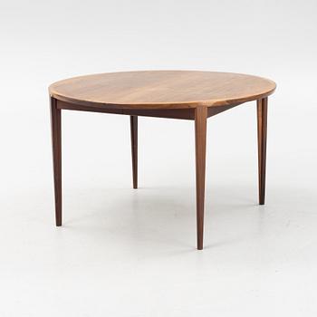 A rosewood-veneered 1960's dining table.