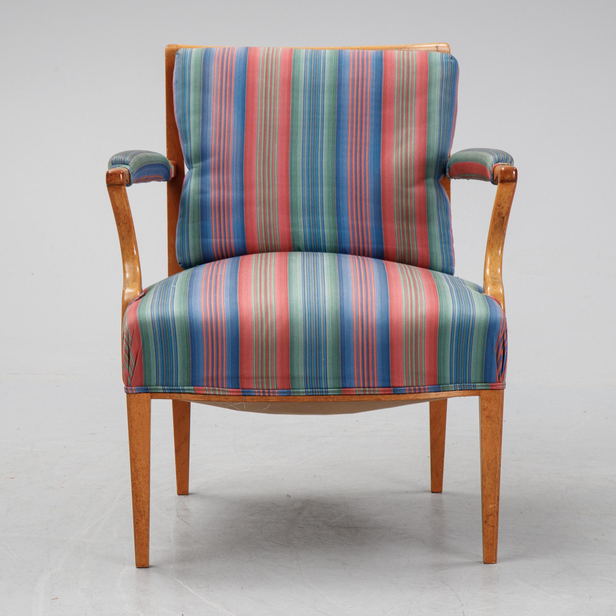 Josef Frank, a mahogany model 969 armchair from Svenskt Tenn.