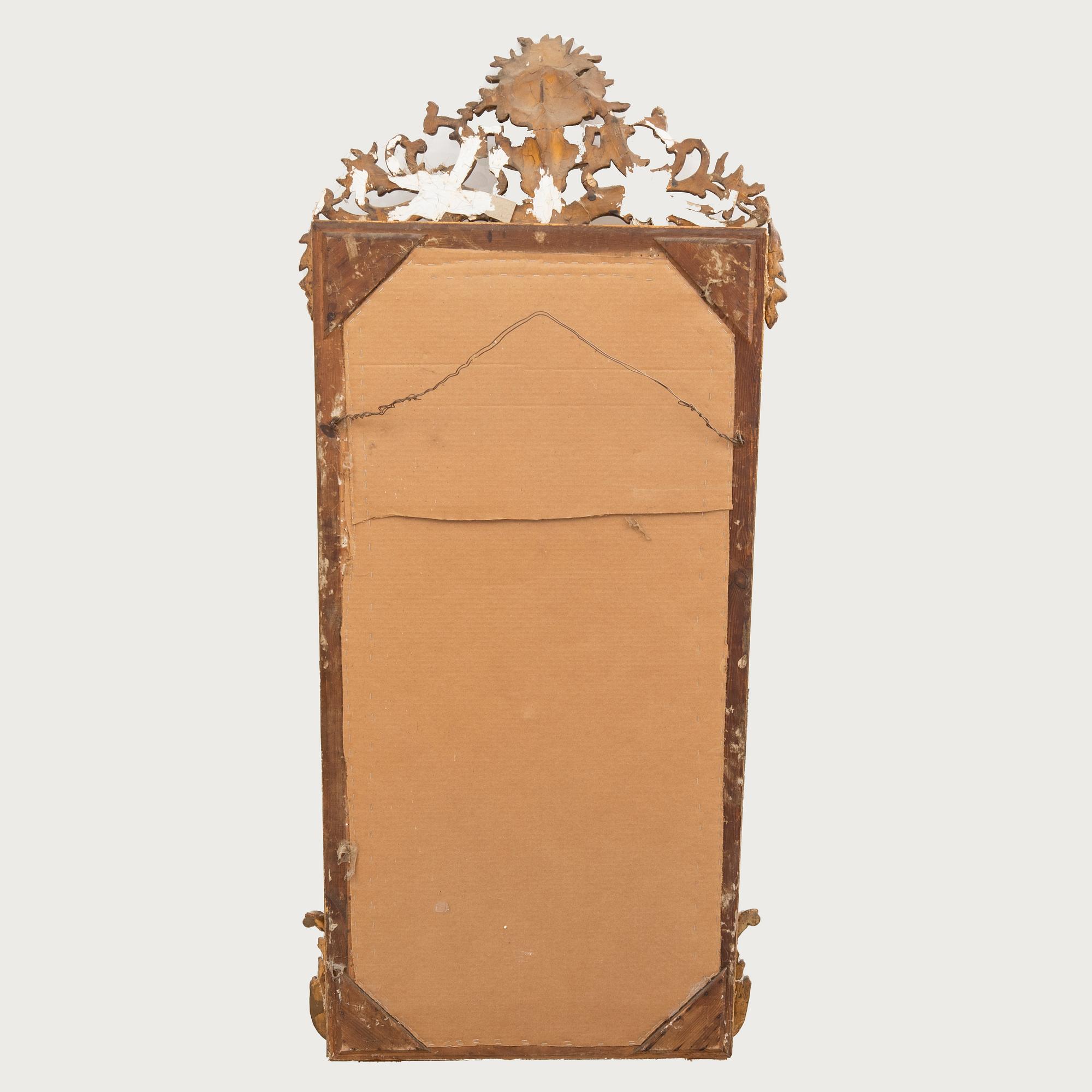 A Neo Rococo bronzed mirror around 1900.