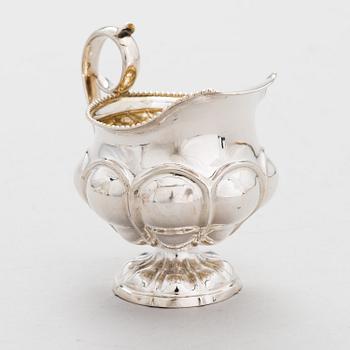 GUSTAF ADOLF BJÖRKLUND, Strösked, gräddsnäcka och skedar, silver, totalt 18 delar, Joensuu, Finland 1870.