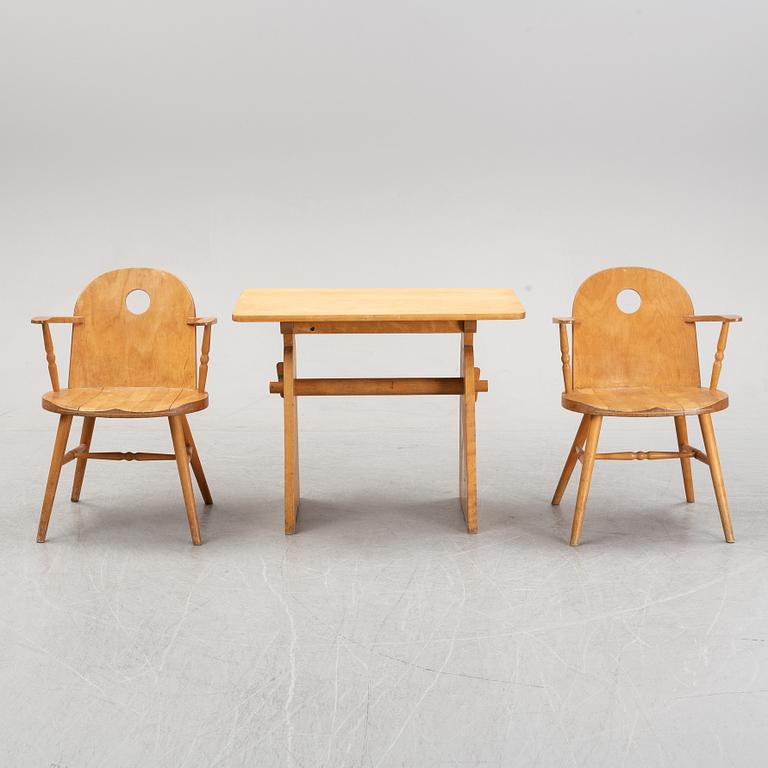 Uno Åhrén, a birch and beech table and pair of armchairs, Gemla, 1930's.