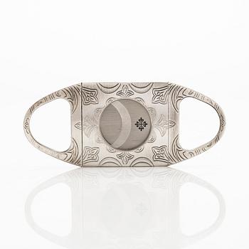 Patek Philippe, sikarileikkuri sekä kotelo.