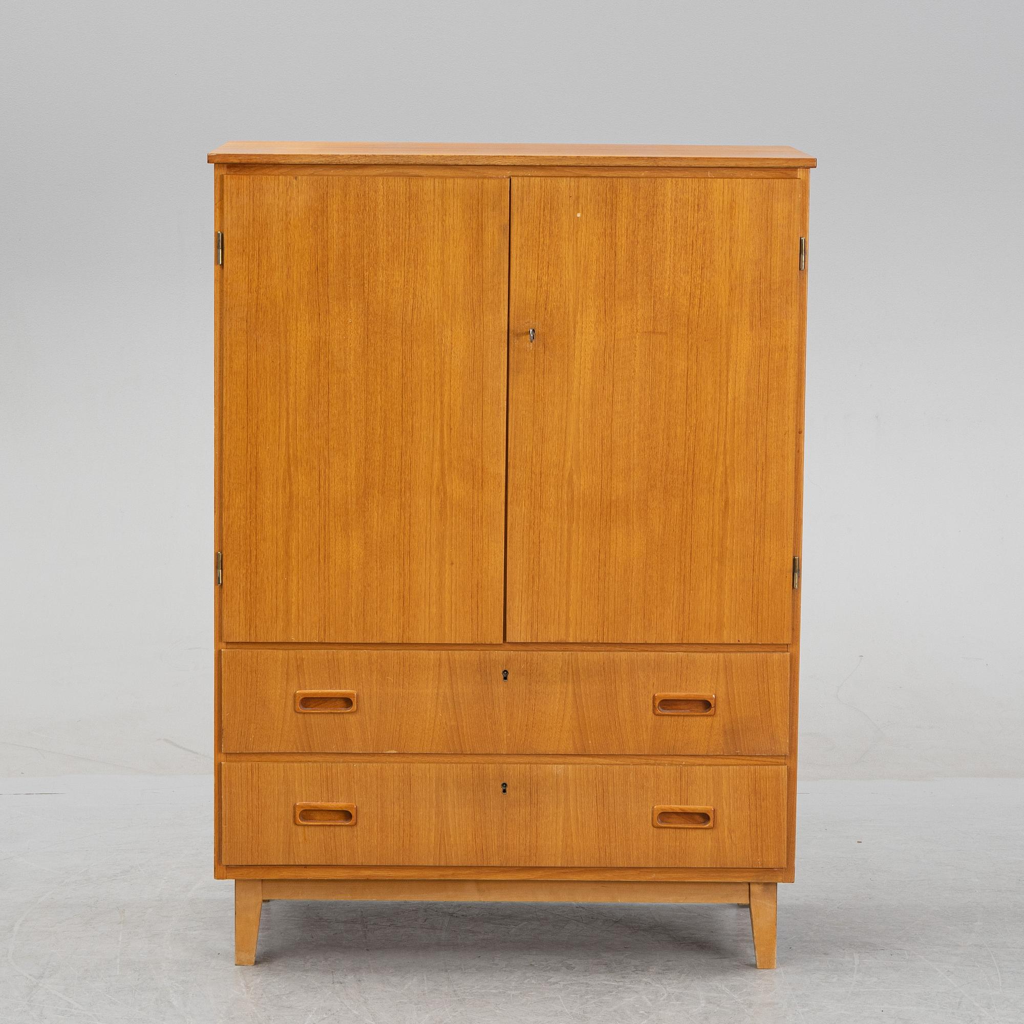A 1950's/60's teak cabinet.