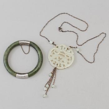 A Chinese armband and a pendant, 20th Century.