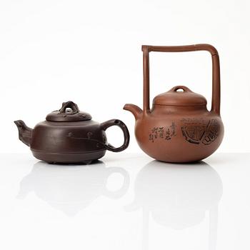 Two Chinese yixing teapots, early 1900s and 1980s.