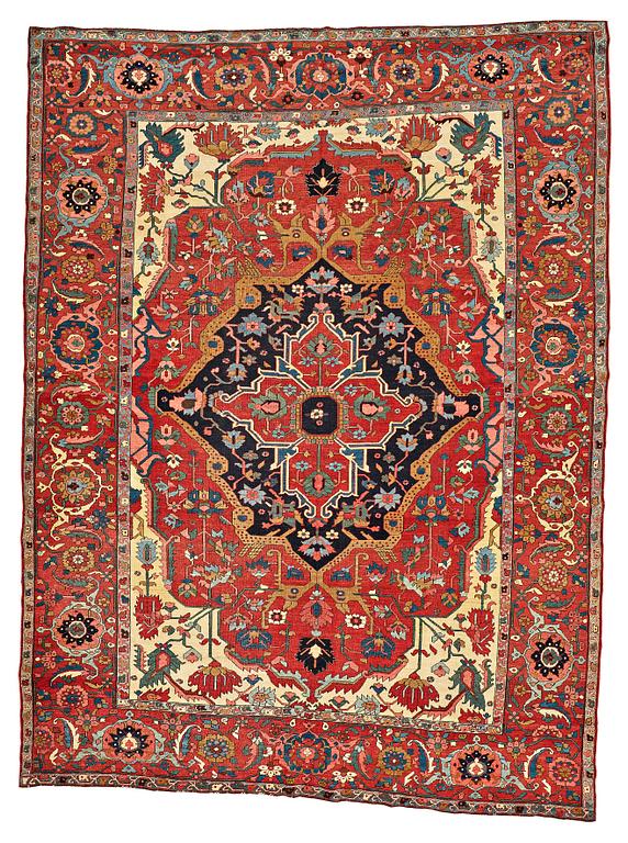 A CARPET, an antique Heriz, a so called Serapi, ca 371 x 282,5 cm.