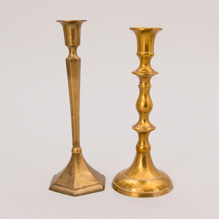 Set of ten 19th/20th Century brass and wood candlesticks.