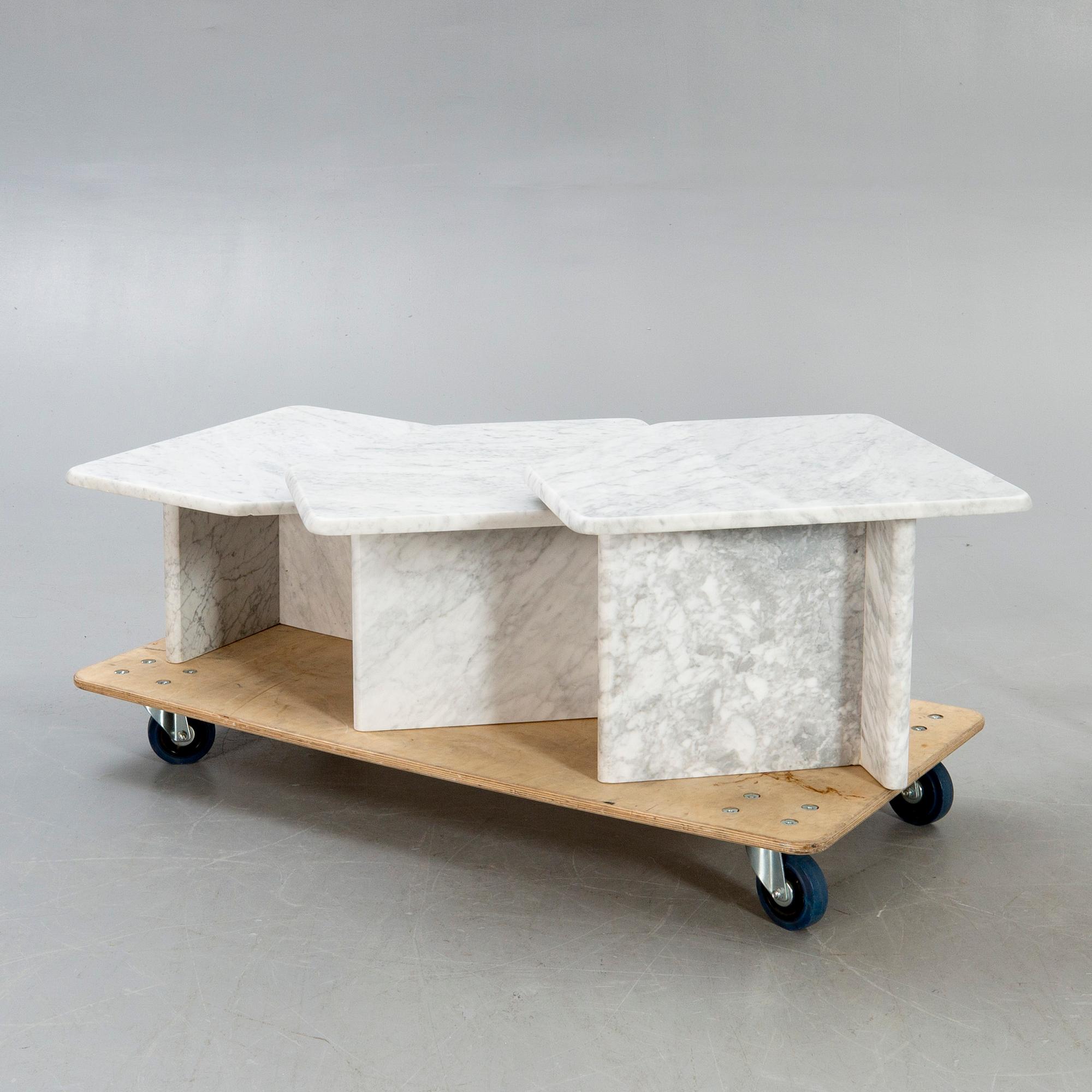 A three pcs marble coffee table later part of the 20th century.