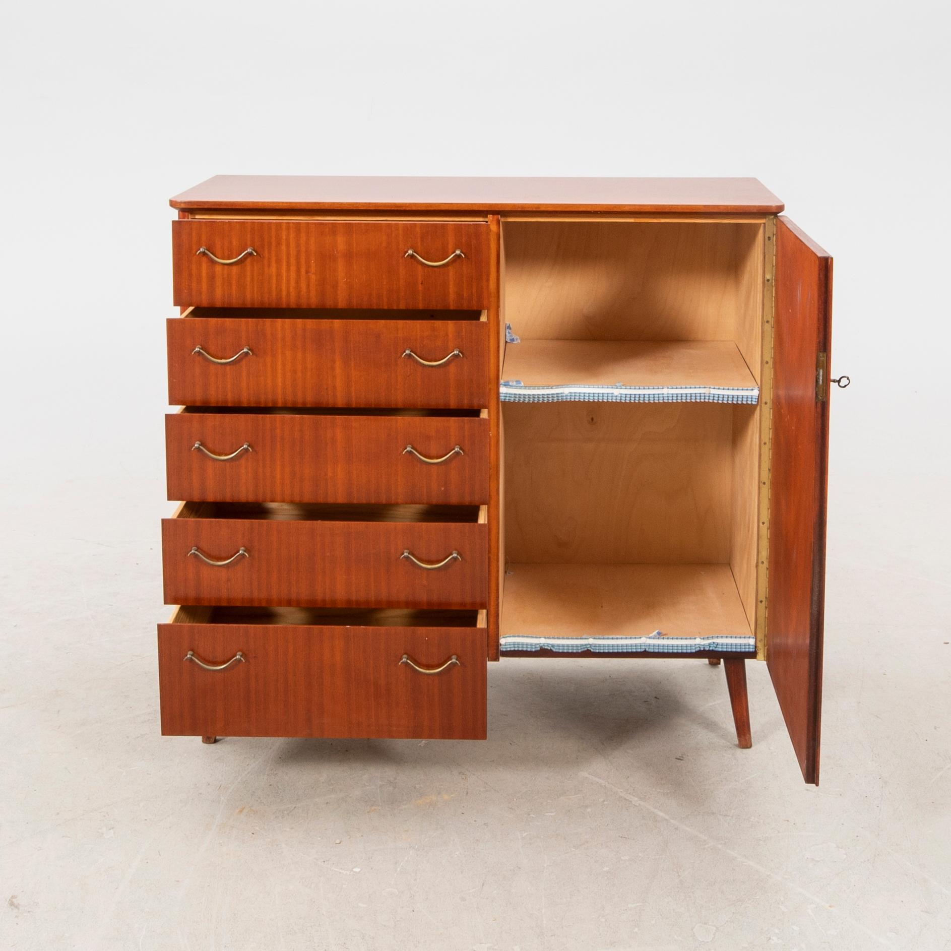 A 1950s teak sideboard/cabinet.